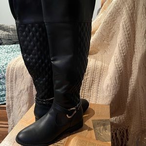 Never worn women’s black calf-length boots